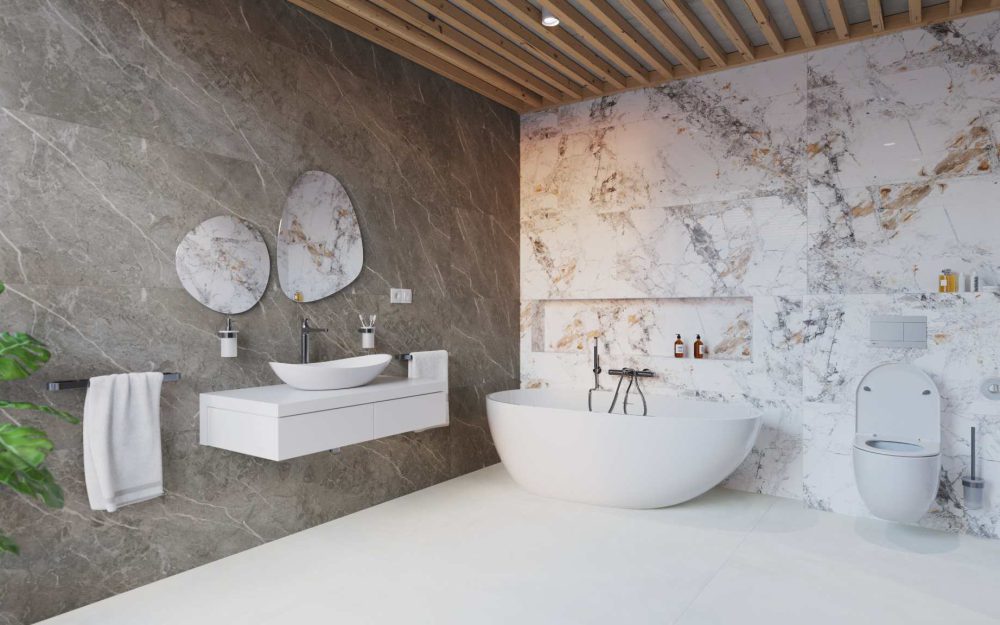 SIKO Moderní koupelna s volně stojící vanou a obkladem v designu mramoru.