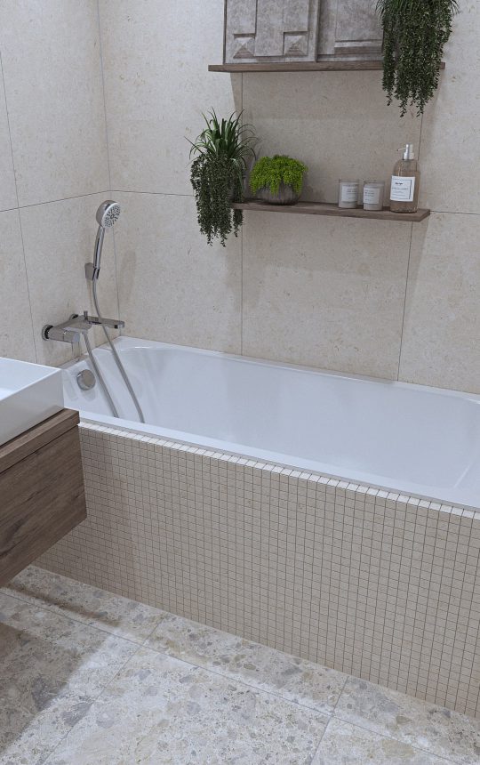 Zazděná vana z recyklovaného materiálu v moderní koupelně s kamennou dlažbou.