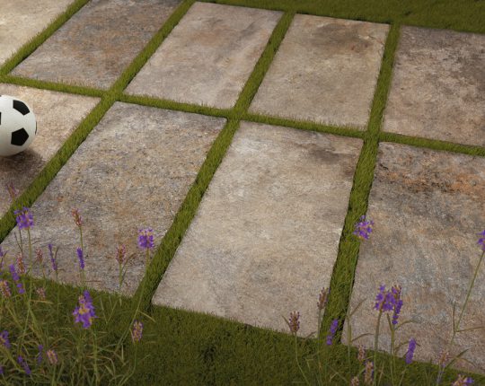 SIKO Ukázka pokládky venkovní dlažby v designu kamene suchou cestou přímo do trávníku.