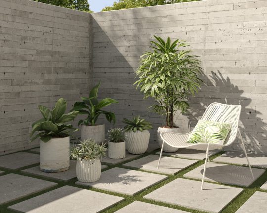 SIKO Venkovní 2 cm dlažba na terasu v designu cementu položená na přímo do trávníku.