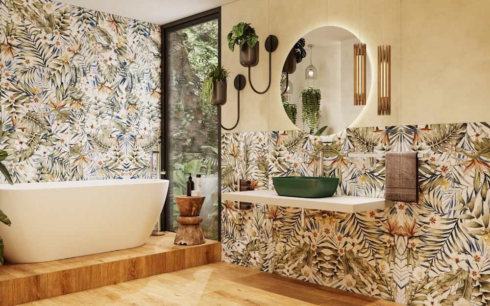 SIKO Moderná kúpeľňa s farebným umývadlom na dosku, voľne stojacou vaňou a obkladom v dizajne kvetín tropical, drevená dlažba.