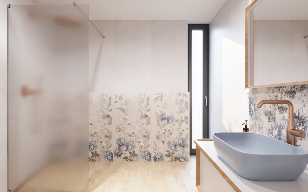 SIKO Moderná kúpeľňa so sprchovacím kútom walk in, umývadlo na dosku a stojanková umývadlová batéria rose gold, obklad s kvetinovým motívom.