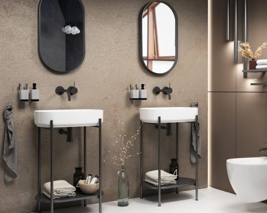 SIKO Moderné oválne zrkadlo v čiernom kovovom ráme je ideálne v modernej kúpeľni s tmavými stenami a bielou dlažbou.