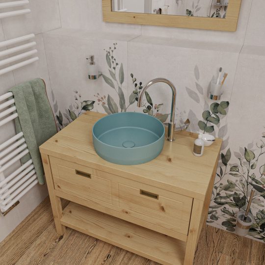 SIKO Dřevěná umyvadlová zásuvková skříňka s barevným umyvadlem na desku. květinový obklad a dřevěná podlaha.