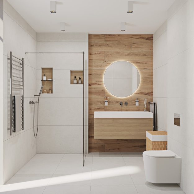 SIKO Malá koupelna, bílý obklad, dřevěný obklad, závěsná skříňka s umyvadlem, kulate zrcadlo, závěsné WC, walk-in sprchový kout.