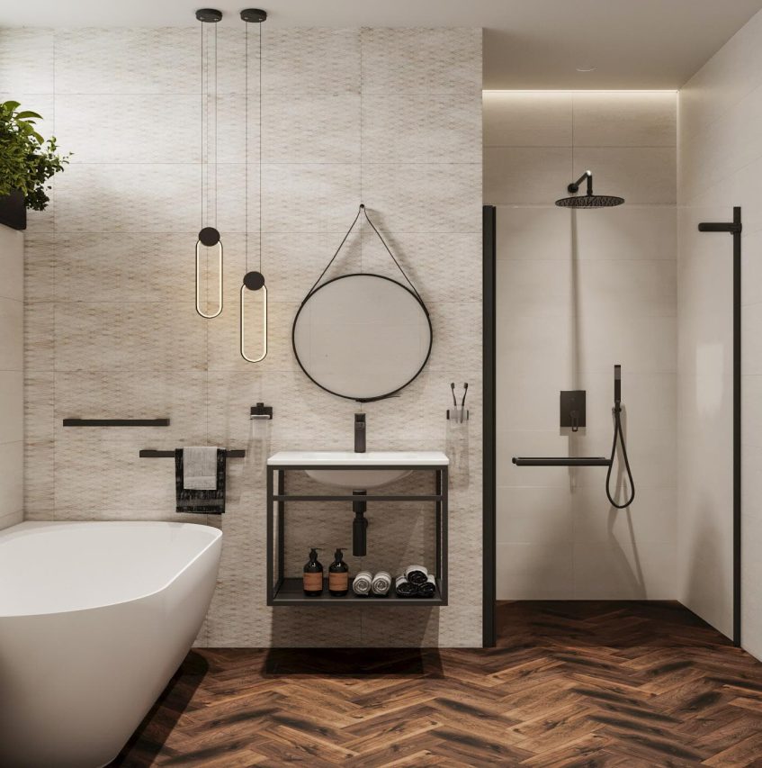 SIKO Sprchový kout a vana v jedné koupelně, dřevěná tmavá dlažba a světlý obklad. Kulaté zrcadlo na řemenu.