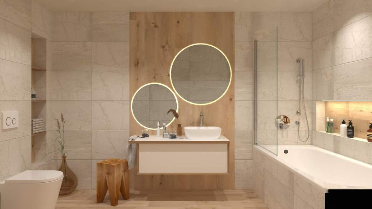 SIKO Velká koupelna, mramorový obklad, dřevěná dlažba, obezděná vana s vanovou zástěnou, osvětlená nika, velká kulata podsvícená zrcadla