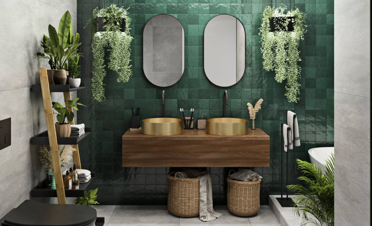 SIKO Tipy na vánoční dárky. Koupelna v boho stylu, zelené obklady, oválná designová zrcadla, stylový dřevěný regál, černé doplňky do koupelny.