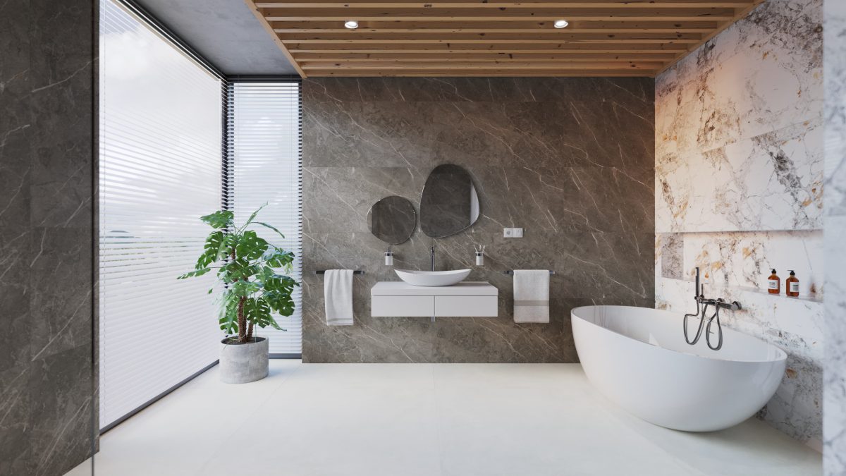 SIKO Velká koupelna šedý a bílý mramor, volně stojící vana, nika, velkoformátová dlažba a obklad.