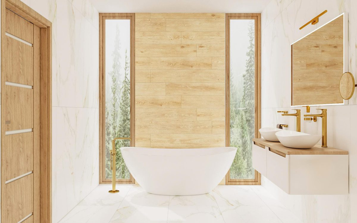 SIKO velká světlá koupelna s bílým mramorem, zlatými a dřevěnými detaily, volně stojící vana, oválné umyvadlo na desku, závěsná skříňka pod umyvadl