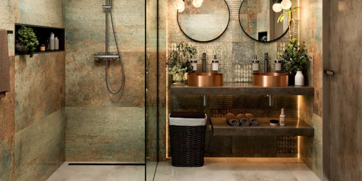 SIKO_COVER_Inspirace novinky obklady a dlažba v měděném metalickém designu, moderní koupelna, dvě měděná umyvadla na desku, černé doplňky, kulatá zrcadla, walk in